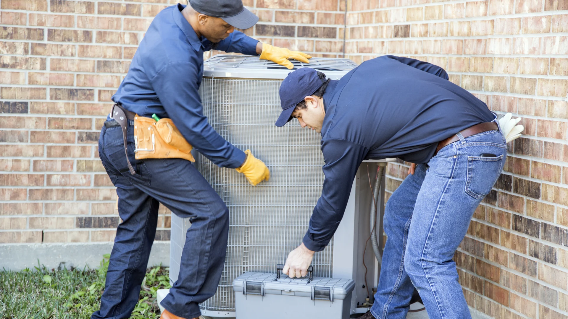 photo of technicians working on hvac system